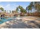 Community pool surrounded by lush greenery at 43 New Rhododendron, Chapel Hill, NC 27517