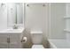 Pristine bathroom with modern fixtures, vanity, and a clean, bright bathtub and shower combination at 431 Mattox St, Wendell, NC 27591