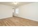 Bright bedroom features wood-look flooring and a ceiling fan at 431 Mattox St, Wendell, NC 27591