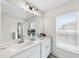 Bright bathroom with double vanity, modern fixtures, and plenty of counter space at 547 Gateway Townes Blvd, Wake Forest, NC 27587