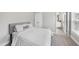 This bedroom features a queen bed, neutral walls, carpet and bathroom access at 547 Gateway Townes Blvd, Wake Forest, NC 27587