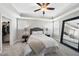 Bright bedroom with a walk-in closet, king bed, and neutral color palette at 547 Gateway Townes Blvd, Wake Forest, NC 27587