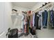 Organized walk-in closet with ample hanging space and shelving at 547 Gateway Townes Blvd, Wake Forest, NC 27587