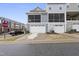 Townhome garages with screened-in porch above offering privacy at 547 Gateway Townes Blvd, Wake Forest, NC 27587