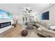 Inviting living room with a fireplace and contemporary decor at 547 Gateway Townes Blvd, Wake Forest, NC 27587