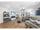 Cozy living room with a modern fireplace and comfortable seating at 547 Gateway Townes Blvd, Wake Forest, NC 27587