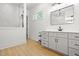Modern bathroom with sleek vanity, bright lighting, and a separate shower at 5750 Nc Highway 49, Burlington, NC 27215