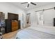 Well-lit bedroom with TV, comfortable bed, and ensuite bathroom access at 5750 Nc Highway 49, Burlington, NC 27215