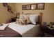 Cozy bedroom featuring a bed, neutral colors, and framed artwork, creating a relaxing retreat at 7027 Old 421 Rd, Liberty, NC 27298