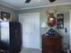 Bedroom featuring hunting trophies, wood dresser and closet with green walls at 7027 Old 421 Rd, Liberty, NC 27298