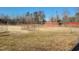 Well-maintained horse arena featuring sturdy metal fencing and ample space for training and riding at 7027 Old 421 Rd, Liberty, NC 27298