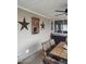 Covered patio with seating, western decor, and ample space for relaxation at 7027 Old 421 Rd, Liberty, NC 27298