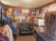 Fully outfitted tack room with neatly arranged ribbons, trunks, and riding gear at 7027 Old 421 Rd, Liberty, NC 27298