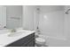 Bathroom with sink, shower-tub combo, and neutral finishes at 749 Aristocrat Ln, Knightdale, NC 27545