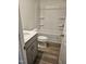 This bathroom showcases modern vanity, wood-look floors, and a clean, white tub at 813 Emmer St, Rolesville, NC 27571