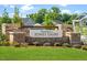 Elegant stone and brick entrance sign for Preserve at Jones Dairy, set amidst lush green landscaping at 813 Emmer St, Rolesville, NC 27571
