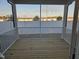 A view from the covered wooden deck overlooking a fenced backyard at 813 Emmer St, Rolesville, NC 27571