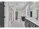 Bright bathroom featuring a glass-enclosed shower, dual vanities, and marble flooring, creating a clean, modern aesthetic at 9169 Dupree Meadow Dr # 26, Angier, NC 27501