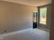 Bedroom with neutral walls, a window for natural light, and white trim at 9169 Dupree Meadow Dr # 26, Angier, NC 27501