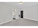 Inviting bedroom with adjoining bathroom access, featuring a neutral color palette and plush carpeting at 9169 Dupree Meadow Dr # 26, Angier, NC 27501