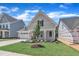 Charming single-Gathering home with a well-manicured lawn, a two-car garage, and a welcoming front porch at 9169 Dupree Meadow Dr # 26, Angier, NC 27501