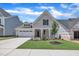 Charming single-Gathering home with a well-manicured lawn, a two-car garage, and a welcoming front porch at 9169 Dupree Meadow Dr # 26, Angier, NC 27501