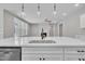 Kitchen island view into the living room and fireplace beyond at 9169 Dupree Meadow Dr # 26, Angier, NC 27501