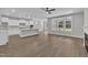Spacious living room and kitchen featuring modern appliances and a large island with pendant lighting at 9169 Dupree Meadow Dr # 26, Angier, NC 27501