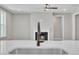 Open floor plan view from the kitchen to the living room and fireplace at 9169 Dupree Meadow Dr # 26, Angier, NC 27501
