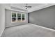 Serene main bedroom with large windows offering natural light and peaceful views at 9169 Dupree Meadow Dr # 26, Angier, NC 27501