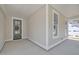 View of the cozy, covered front porch with the home's exterior and front door at 9169 Dupree Meadow Dr # 26, Angier, NC 27501