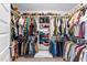 Spacious walk-in closet providing ample storage for clothes, shoes, and accessories at 99 Bodacious Ln, Benson, NC 27504