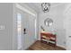 Bright entryway featuring hardwood floors, console table, and modern lighting at 99 Bodacious Ln, Benson, NC 27504