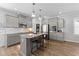 Stylish kitchen featuring granite countertops, stainless steel appliances, and a breakfast bar at 99 Bodacious Ln, Benson, NC 27504