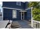 Charming outdoor deck with dining set and striped rug, perfect for relaxing at 101 S Bloodworth St, Raleigh, NC 27601