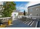 Stylish outdoor space with a modern dining set and striped rug for entertaining at 101 S Bloodworth St, Raleigh, NC 27601