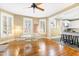 Open dining room with hardwood floors, a ceiling fan, and seamless access to the kitchen area, great for modern living at 101 S Bloodworth St, Raleigh, NC 27601