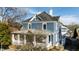 Beautiful two-story house featuring gray siding and a welcoming front porch at 101 S Bloodworth St, Raleigh, NC 27601