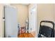 Storage space in the hallway with an additional storage cabinet and shelving with space to hang items at 101 S Bloodworth St, Raleigh, NC 27601