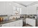 Updated kitchen with granite counters, stainless steel appliances, and great natural light at 101 S Bloodworth St, Raleigh, NC 27601