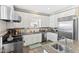 Kitchen boasts stainless steel appliances, granite countertops, and ample cabinet space at 101 S Bloodworth St, Raleigh, NC 27601