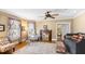 Bright living room boasts hardwood floors, a ceiling fan, and colorful decor at 101 S Bloodworth St, Raleigh, NC 27601