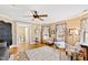 Inviting living area features hardwood floors, a ceiling fan, and abundant natural light at 101 S Bloodworth St, Raleigh, NC 27601