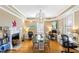 Spacious office with decorative fireplace, ample desks, and natural light perfect for productivity and comfort at 101 S Bloodworth St, Raleigh, NC 27601