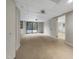 Finished basement featuring carpeted floor, bright walls, and access to the outdoors at 106 Woodland Dr, Cary, NC 27513