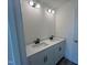 Bathroom featuring double sink vanity with modern black hardware at 107 Willow Cameron Way, Angier, NC 27501