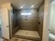 Beautiful bathroom with tile shower and dual showerheads at 107 Willow Cameron Way, Angier, NC 27501