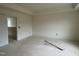 Bedroom with neutral walls and large windows providing ample natural light and open doorway at 107 Willow Cameron Way, Angier, NC 27501