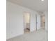 Bright bedroom featuring neutral carpet and a bathroom en suite at 107 Willow Cameron Way, Angier, NC 27501