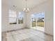 Dining area with sliding glass doors leading to backyard and views of the neighborhood at 107 Willow Cameron Way, Angier, NC 27501